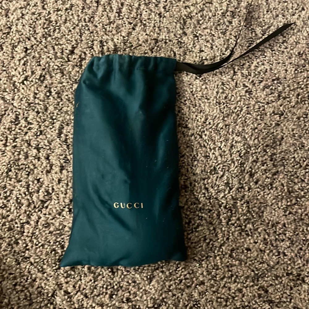 Gucci Glasses with container bag and wipe